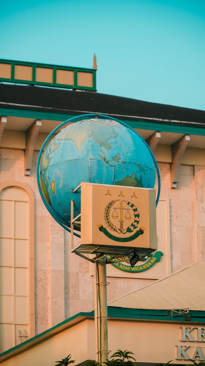 A modern monument symbolizing global justice in Pontianak, Indonesia.